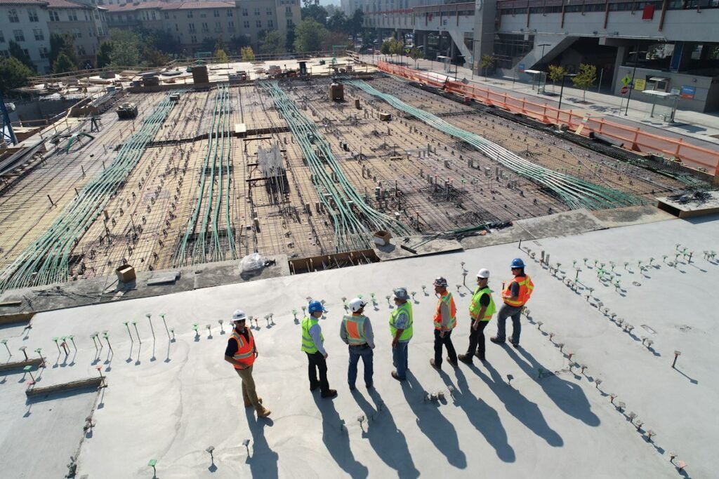 Crew working on a large building site seen from above